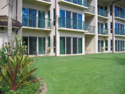 Tropical Kauai 2 Bedroom Vacation Rental in Waipouli Kauai - Green Belt Fronting Private Patio